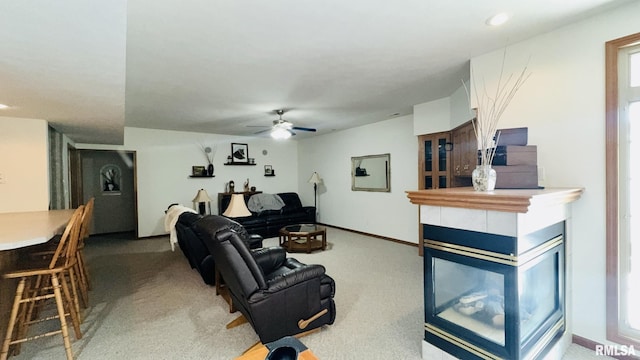1016 Michael Ln, West Frankfort, IL 62812 - living area featuring light colored carpet, a ceiling fan, and a multi sided fireplace