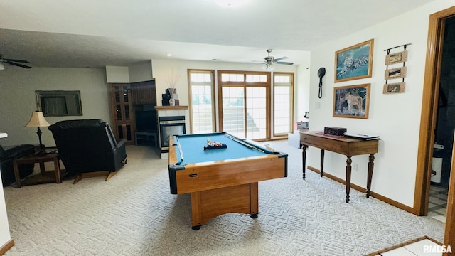 1016 Michael Ln, West Frankfort, IL 62812 - recreation room featuring ceiling fan, light colored carpet, and a glass covered fireplace