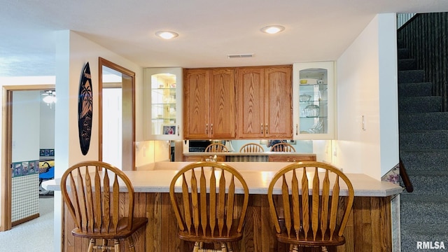 1016 Michael Ln, West Frankfort, IL 62812 - dining space with stairs, carpet flooring, and recessed lighting