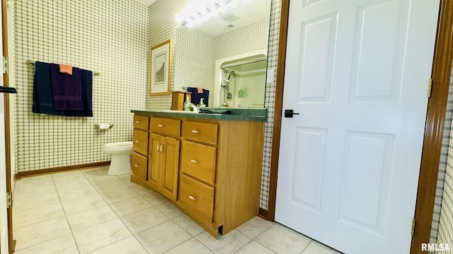 1016 Michael Ln, West Frankfort, IL 62812 - full bathroom with vanity, tile patterned floors, a shower with shower door, and wallpapered walls