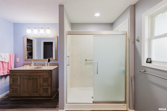 11823 Taylor Dr, Marion, IL 62959 - full bath featuring a stall shower, vanity, and wood finished floors