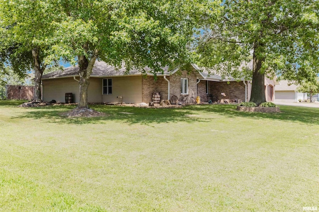 11823 Taylor Dr, Marion, IL 62959 - ranch-style house with a front yard and brick siding