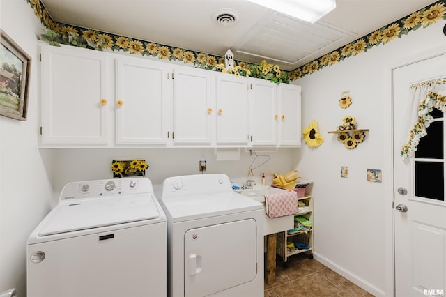 11823 Taylor Dr, Marion, IL 62959 - laundry room featuring washer and clothes dryer, cabinet space, and tile patterned flooring