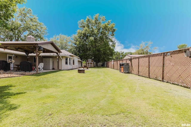 11823 Taylor Dr, Marion, IL 62959 - fenced backyard featuring a shed, a gazebo, and a patio