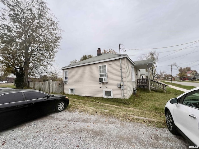 726 Maple St Unit 3, Murphysboro, IL 62966 - view of side of home with a chimney and cooling unit