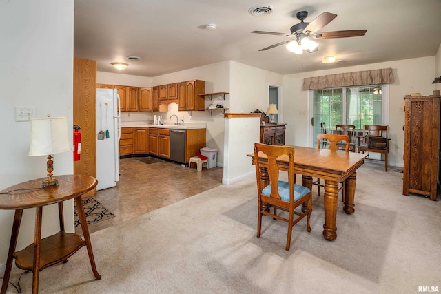 508 Lexington Ct, Carbondale, IL 62901 - dining space featuring a ceiling fan, light colored carpet, and light floors
