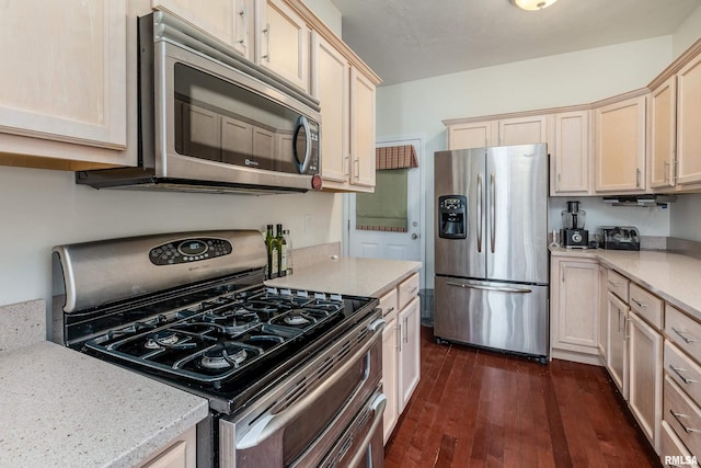 1002 Villa Ct, Carbondale, IL 62901 - kitchen with appliances with stainless steel finishes and dark wood-type flooring