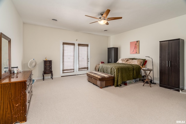 1002 Villa Ct, Carbondale, IL 62901 - bedroom with light carpet and ceiling fan