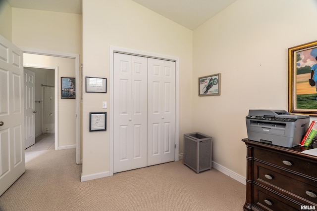1002 Villa Ct, Carbondale, IL 62901 - bedroom with light carpet, a closet, and lofted ceiling