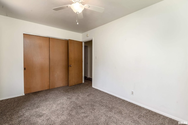 1811 W Freeman St, Carbondale, IL 62901 - unfurnished bedroom featuring carpet floors, a closet, and ceiling fan