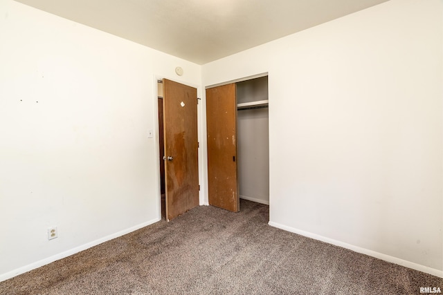 1811 W Freeman St, Carbondale, IL 62901 - unfurnished bedroom with carpet flooring and a closet