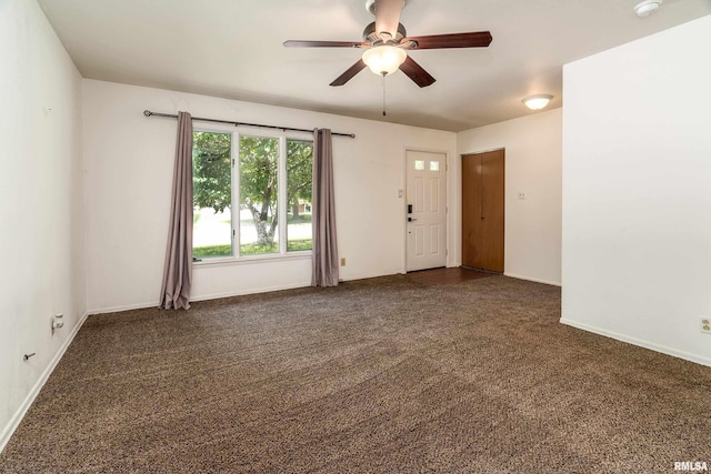 1811 W Freeman St, Carbondale, IL 62901 - carpeted empty room with a ceiling fan and a smoke detector