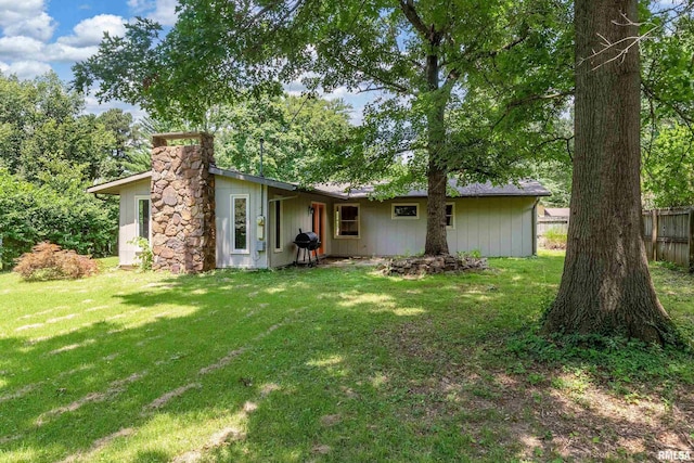 1811 W Freeman St, Carbondale, IL 62901 - rear view of house featuring a chimney