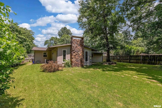 1811 W Freeman St, Carbondale, IL 62901 - rear view of property with a chimney