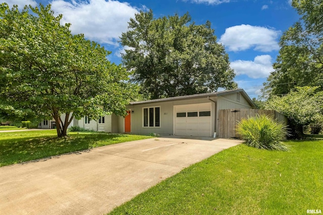 1811 W Freeman St, Carbondale, IL 62901 - view of front of house with an attached garage and concrete driveway
