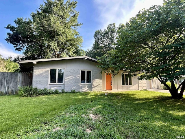1811 W Freeman St, Carbondale, IL 62901 - view of front of house featuring brick siding and board and batten siding