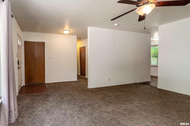 1811 W Freeman St, Carbondale, IL 62901 - empty room featuring carpet floors, a ceiling fan, and a smoke detector