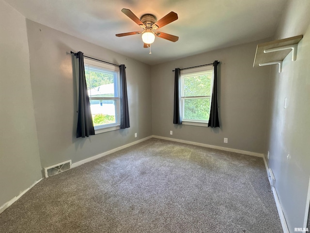 403 Freeman St, Anna, IL 62906 - carpeted spare room with ceiling fan and baseboards