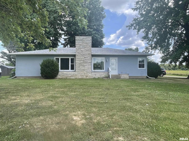 17726 Quiet Acres Rd, Scheller, IL 62883 - back of house featuring a yard and a chimney