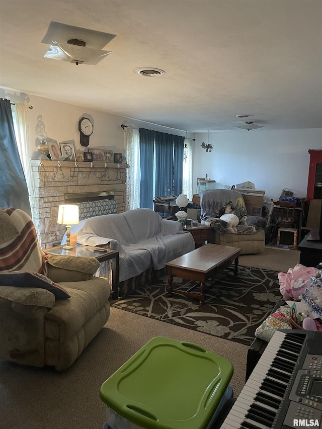 17726 Quiet Acres Rd, Scheller, IL 62883 - carpeted living room with a fireplace