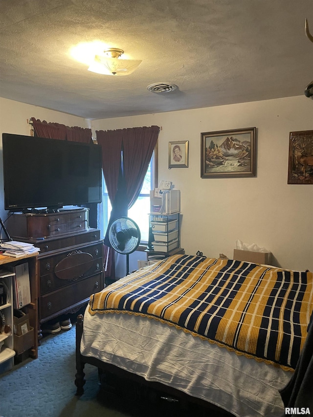 17726 Quiet Acres Rd, Scheller, IL 62883 - carpeted bedroom with a textured ceiling