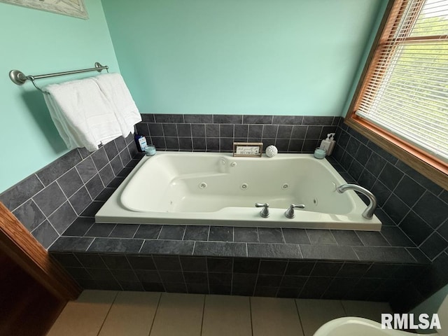418 Michelle Ln, Walcott, IA 52773 - bathroom featuring a tub with jets