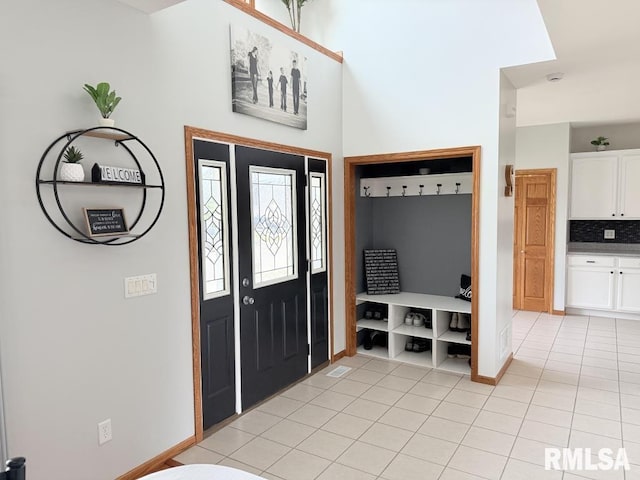 418 Michelle Ln, Walcott, IA 52773 - mudroom featuring light tile patterned floors