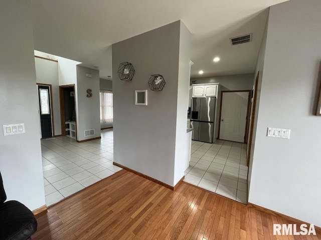 418 Michelle Ln, Walcott, IA 52773 - corridor with light wood-type flooring