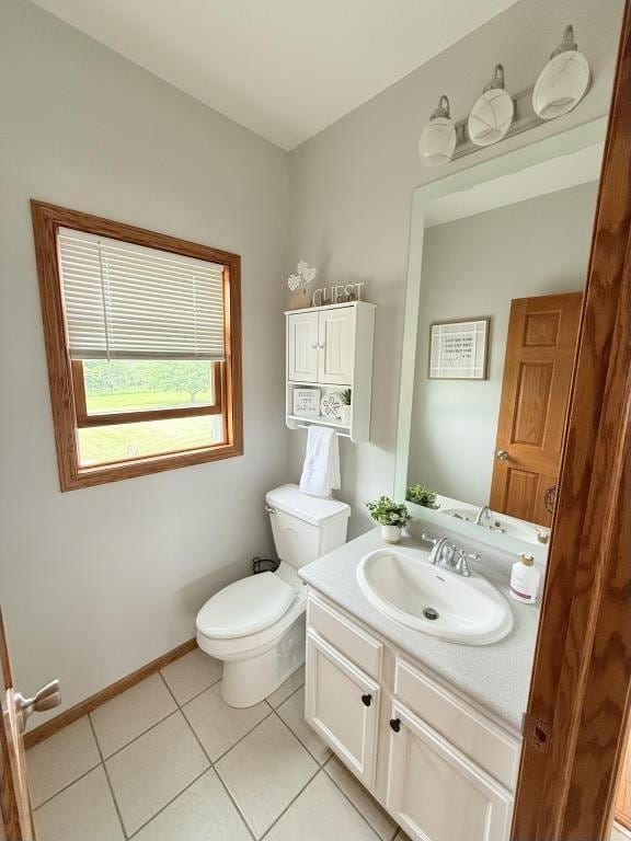 418 Michelle Ln, Walcott, IA 52773 - bathroom featuring vanity and tile patterned flooring