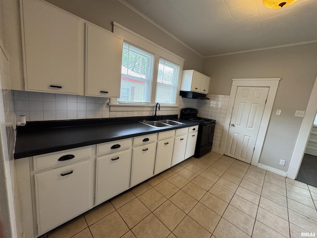 1307 S Maple St, Centralia, IL 62801 - kitchen featuring dark countertops, black range with electric cooktop, light tile patterned floors, white cabinets, and ornamental molding