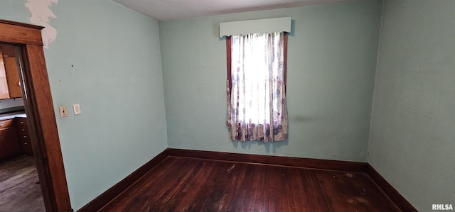 232 N James Ave, Centralia, IL 62801 - empty room with hardwood / wood-style floors and baseboards