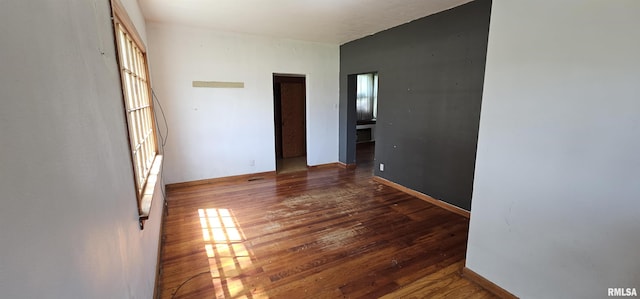 232 N James Ave, Centralia, IL 62801 - spare room with wood-type flooring