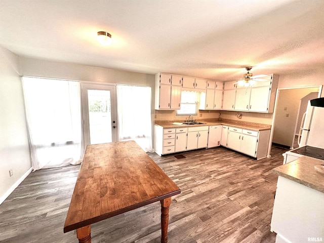 6 Charles Dr, Centralia, IL 62801 - kitchen featuring dark wood-type flooring, ceiling fan, white appliances, and light countertops