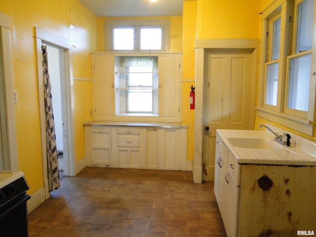 bathroom featuring tile floors and vanity