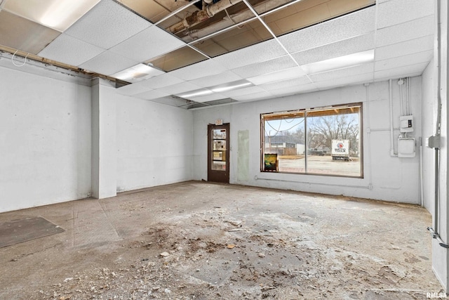 interior space featuring a paneled ceiling