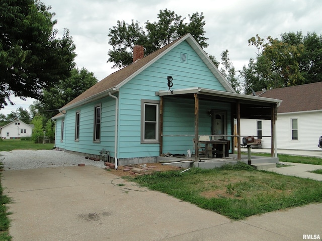 bungalow-style house featuring covered porch