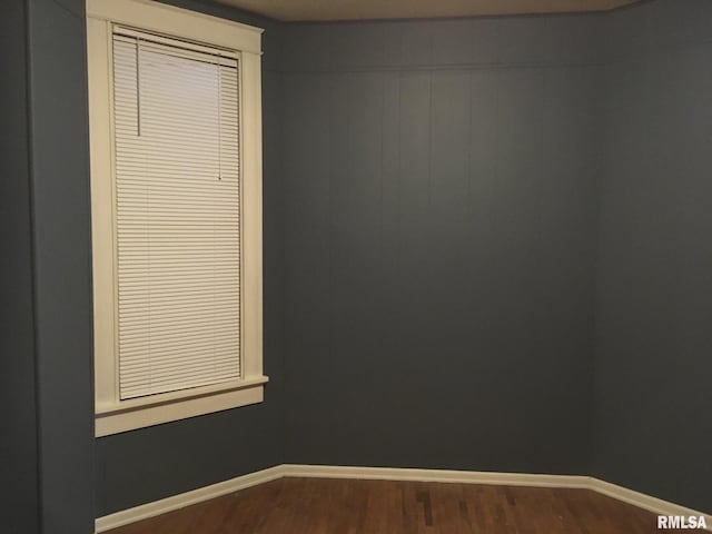 unfurnished room featuring hardwood / wood-style floors