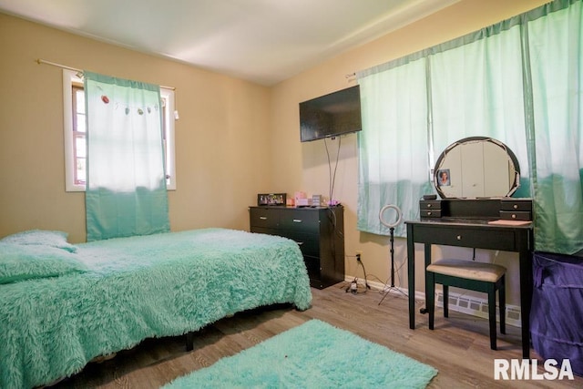 bedroom featuring hardwood / wood-style floors