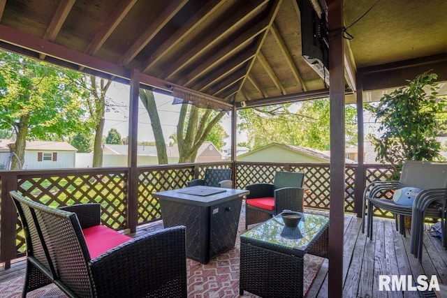 wooden deck with a gazebo