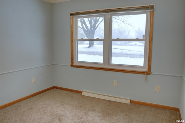 carpeted spare room with baseboard heating