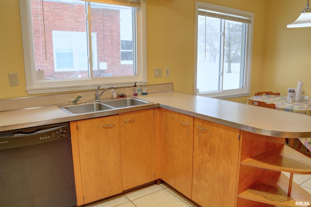 kitchen featuring sink, a healthy amount of sunlight, and black dishwasher