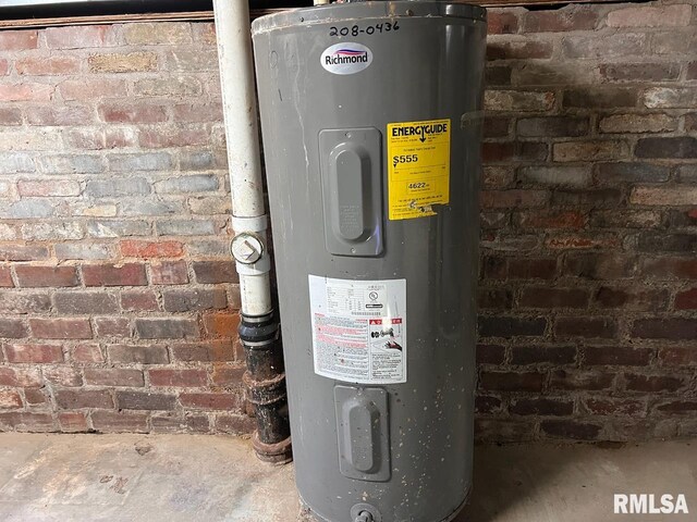 utility room with water heater