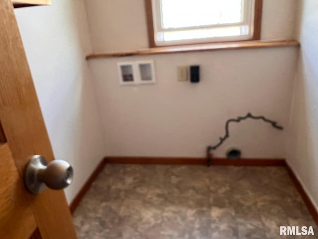 clothes washing area featuring washer hookup and carpet floors