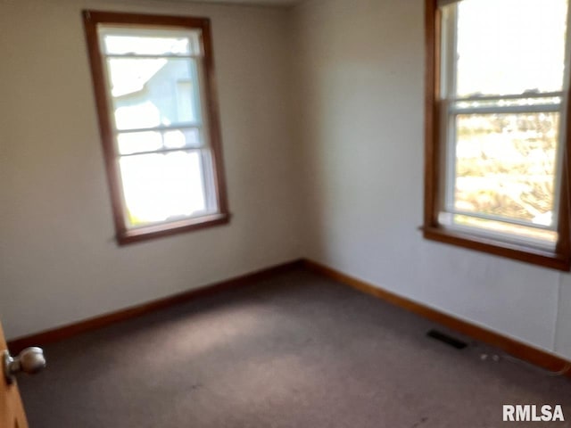 view of carpeted spare room