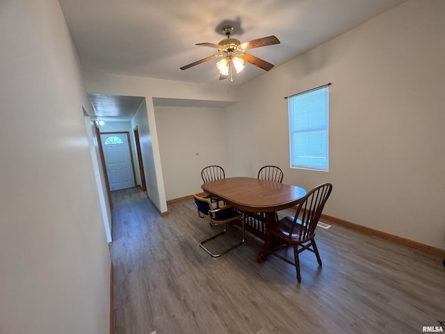 dining room featuring ceiling fan and hardwood / wood-style floors