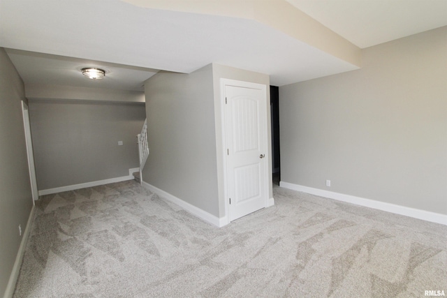 basement with light colored carpet