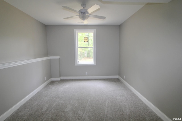 empty room with carpet flooring and ceiling fan