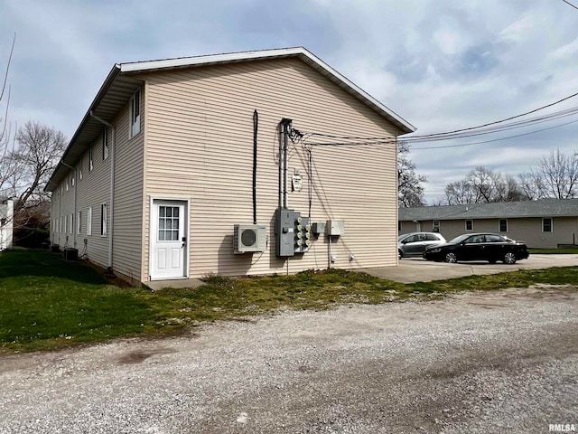 view of home's exterior featuring ac unit