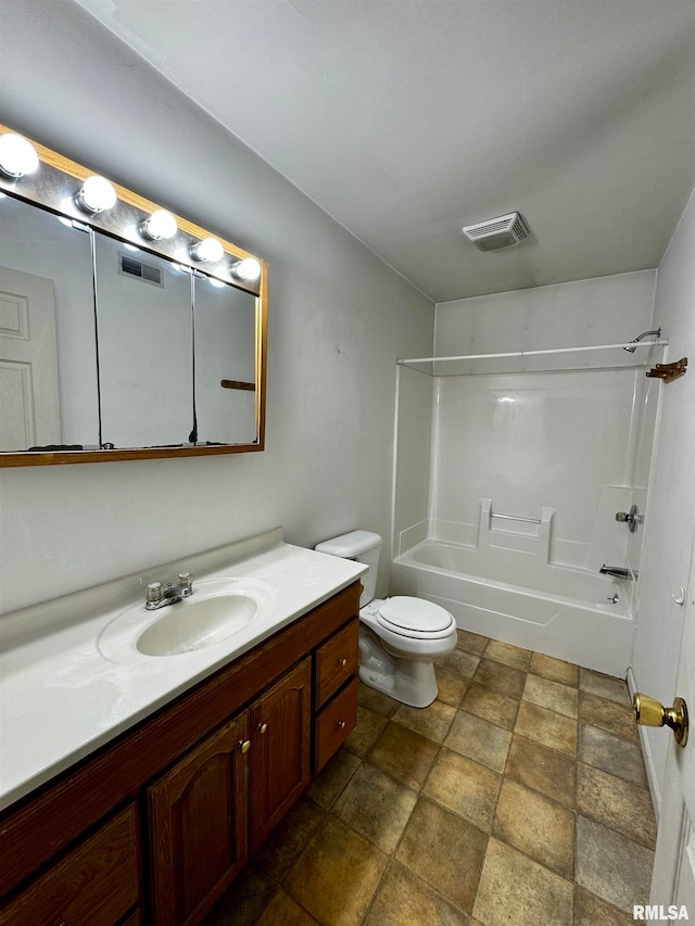 full bathroom with vanity, toilet, and bathtub / shower combination