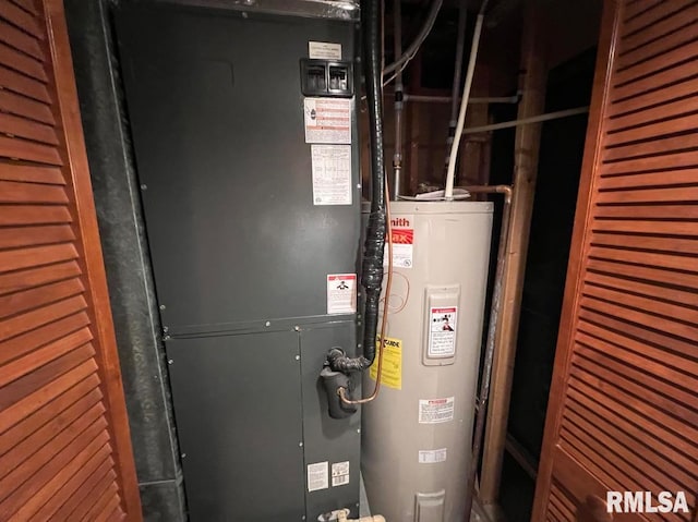 utilities featuring electric water heater and heating unit